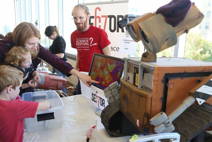 A family examines themselves on an infrared camera