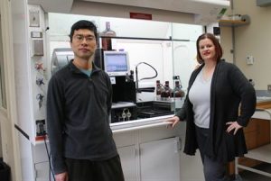 Weiping Tang, professor and co-director of MCC, and Jennifer Golden, assistant professor and MCC associate director, in the Medicinal Chemistry Center
