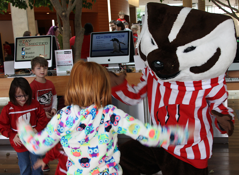 Bucky Badger and fan