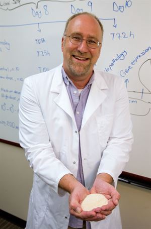 Jim Steele holds a probiotic sample