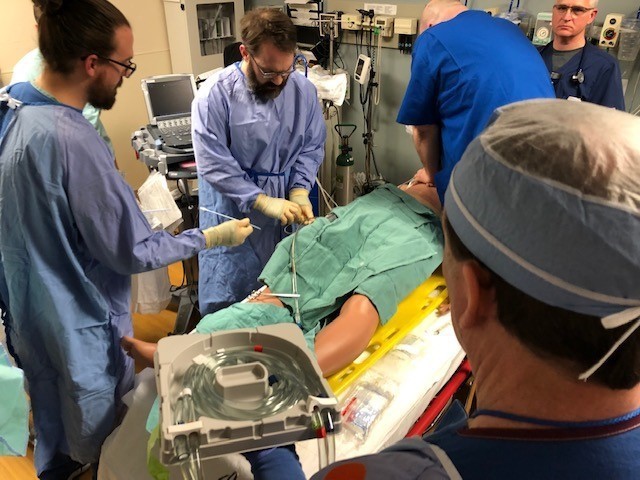 ECMO simulator in use with mannequin during UW training session.